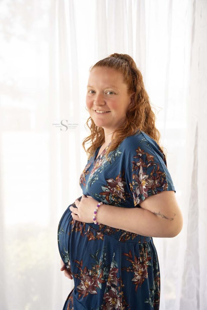 Pregnant and Prepared guest, expectant mother poses for a portrait with Simply Shelayna Maternity Photography in Syracuse NY.